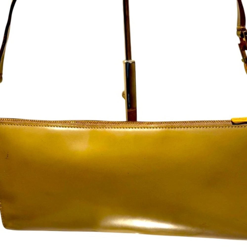 SALVATORE FERRAGAMO CLUTCH IN A VERY BEAUTIFUL COLOR IN EUC
